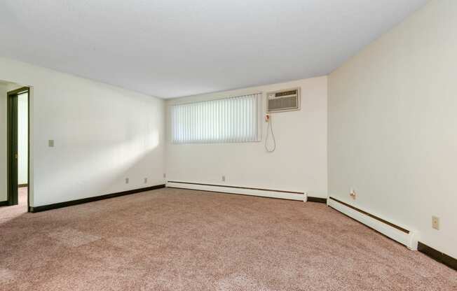 White Bear Lake, MN White Bear Terrace Apartments.  a bedroom with a carpeted floor and a window