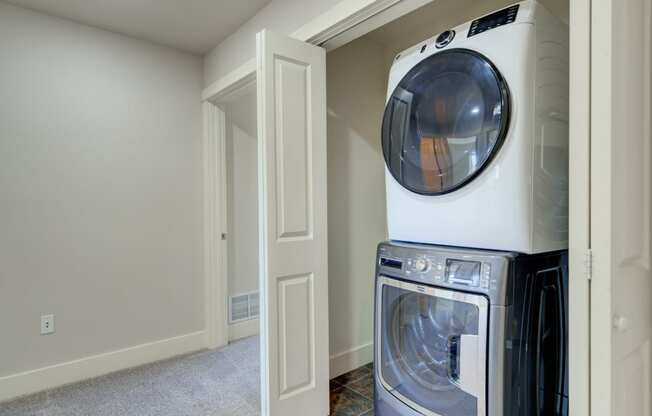 an empty laundry room with a washer and dryer at Copper Pines, Bozeman, MT, 59718