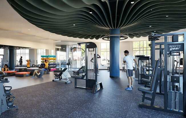 A gym with a person working out.