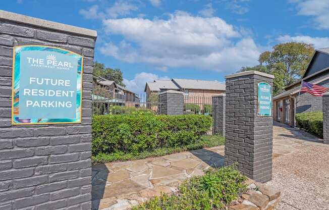 A sign for The Pearl Apartments Future Resident Parking is displayed.