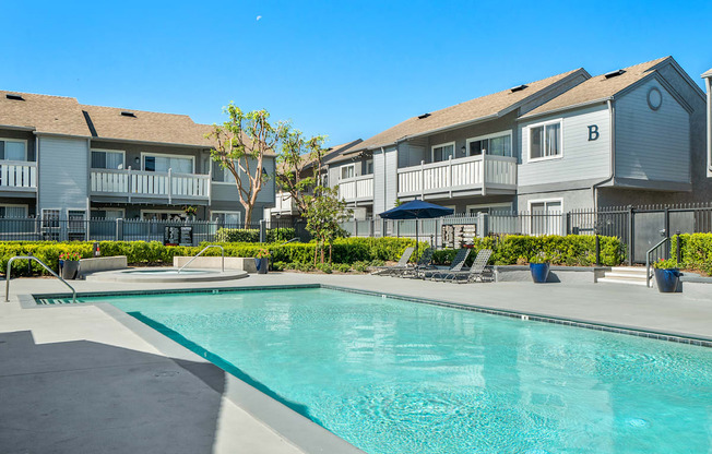 the swimming pool at the falls at rolland park apartments fl