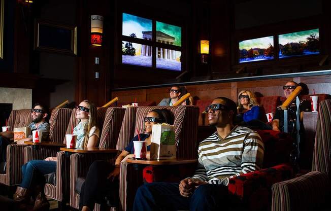 People watching movies in a cinema hall.