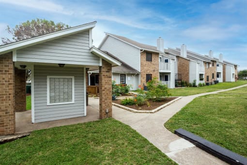 our apartments have a walkway to the street with grass