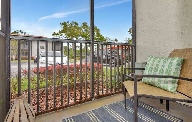 a residential private screened balcony at The Oasis Daytona