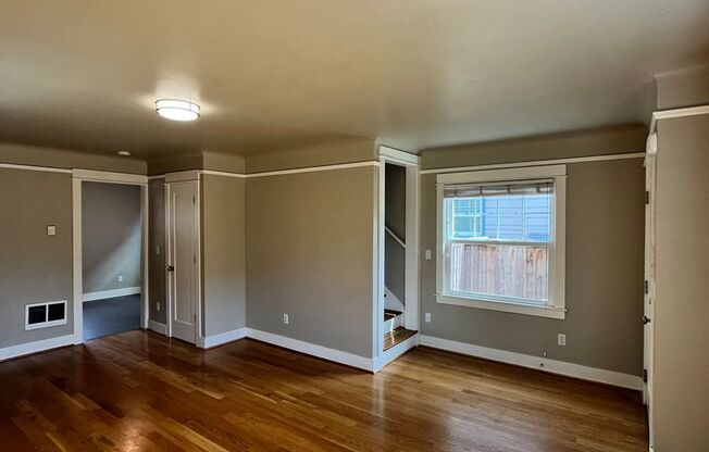 Gorgeous 2-Bedroom Townhome! Hardwood Floors, Private Basement, Garage & Fenced Backyard!