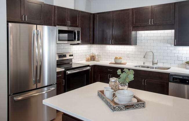 upgraded kitchens with breakfast bar in select townhomes