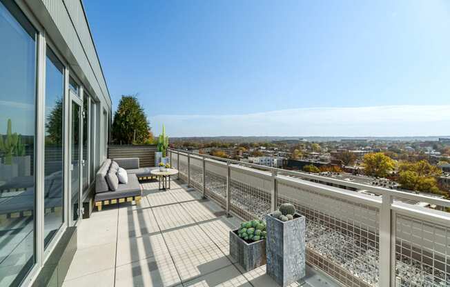 a view of the city from the balcony of a house  at Link Apartments® H Street, Washington, 20002