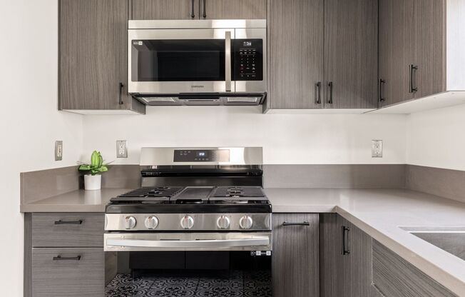 A 4 bedroom, 3 bathroom apartment with a dining room & a fully functional kitchen at 10791 Ohio Ave. Unit 2