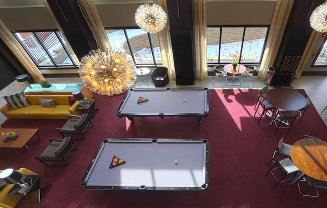 Challenge your neighbors to a game of pool or cozy up to our fireplace and catch up on your favorite shows