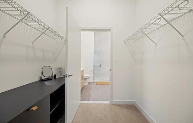 Custom closets with built-in storage and shelving available in select apartments.