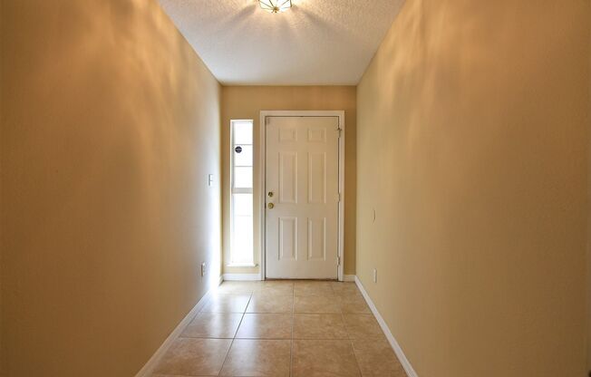 Westside Townhomes 3BR 2BA over 1400 sq/ft in Winter Garden! NEW FLOORING and FRESH PAINT!