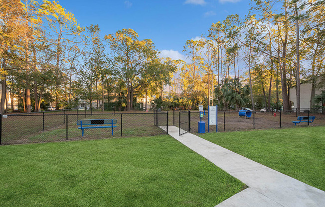 Community Dog Park with Agility Equipment at Heron Walk Apartments in Jacksonville, FL.