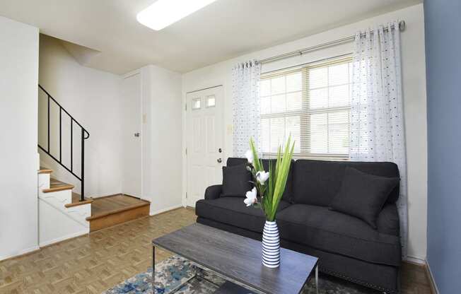 Large living room with lots of natural light  at Kingston Townhomes, Baltimore, 21220