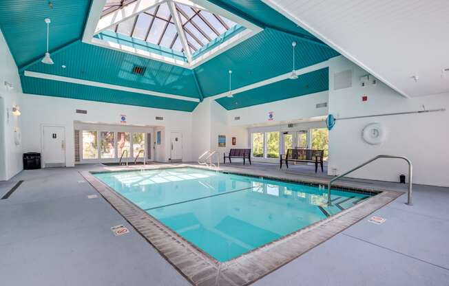 Richmond CA Apartments - Bella Vista At Hilltop - Indoor Pool Surrounded by Two Benches