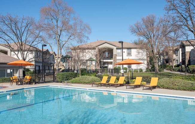 swimming pool and chaises side view at Stoneridge, Roseville, California