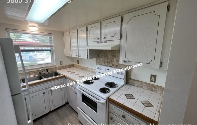 5860 37 AVE N