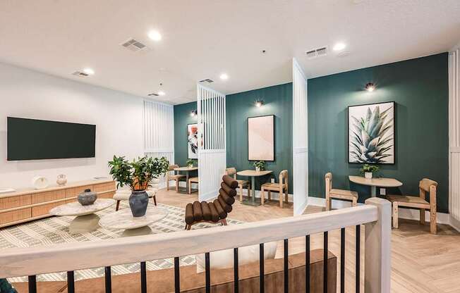 A living room with a white railing in the foreground.