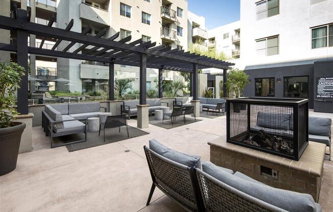 Outdoor courtyard with fire pit at 1724 Highland, Los Angeles, CA