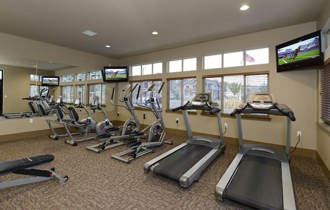 Gym with cardio equipment at COPPER GATE, Auburn, Washington