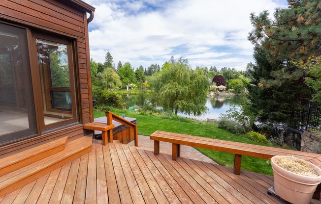 Private river access and stunning views from this home on Harmon Blvd! + Bonus Room