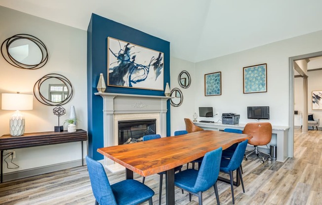 clubhouse interior with fireplace and table seating