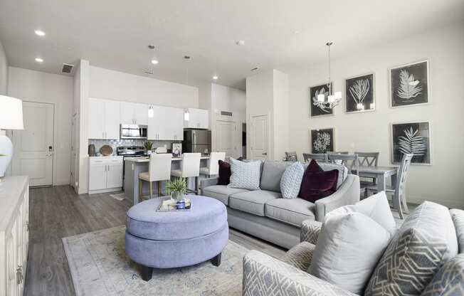 a living room with a couch and a chair at 200 City View, Provo