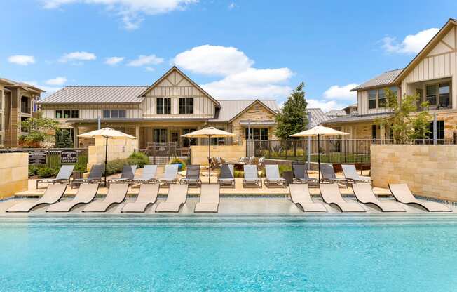 Expansive Pool and Sundeck with Tanning Ledge and Beach Entry