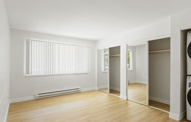 Bedroom with In-home Washer and Dryer