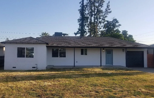 128 W. SANDRA 3 BEDROOM 2 BATHROOM HOME TULARE