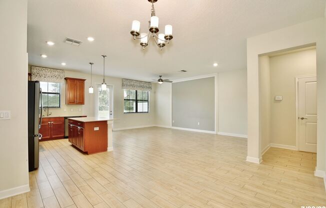 Modern 3/2.5 Spacious Townhome with a 2 Car Garage in the Desirable Trails at Moss Park - Orlando!