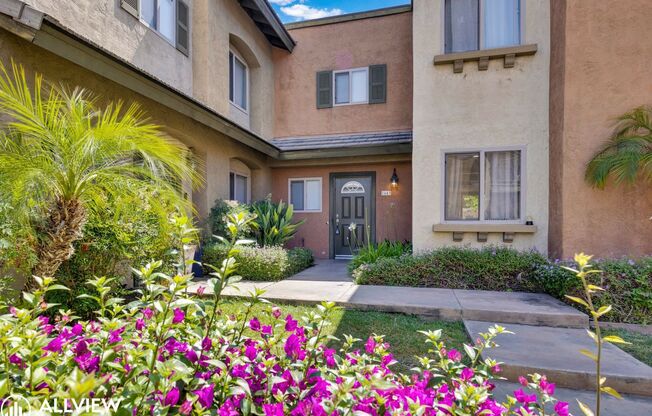 Beautifully Renovated 2-Bedroom Corner Townhome in Gated Community With Modern Upgrades