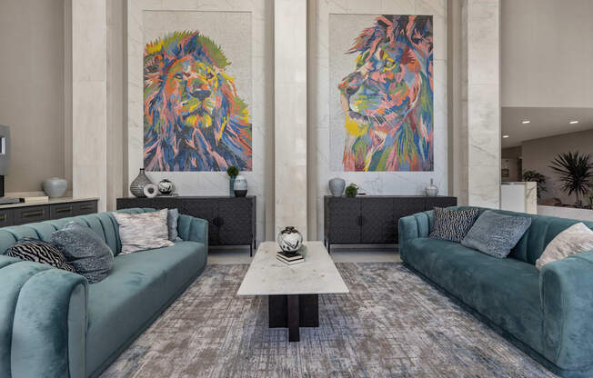 a living room filled with furniture and a large painting of a lion