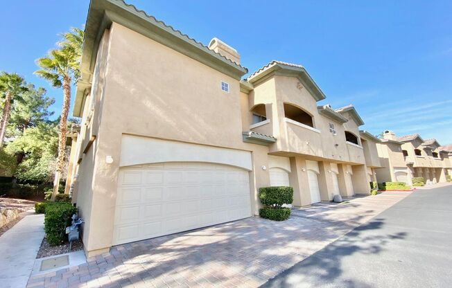 STUNNING 2 BEDROOM, 2 BATH TOWNHOME WITH 2-CAR GARAGE IN GUARD-GATED COMMUNITY!