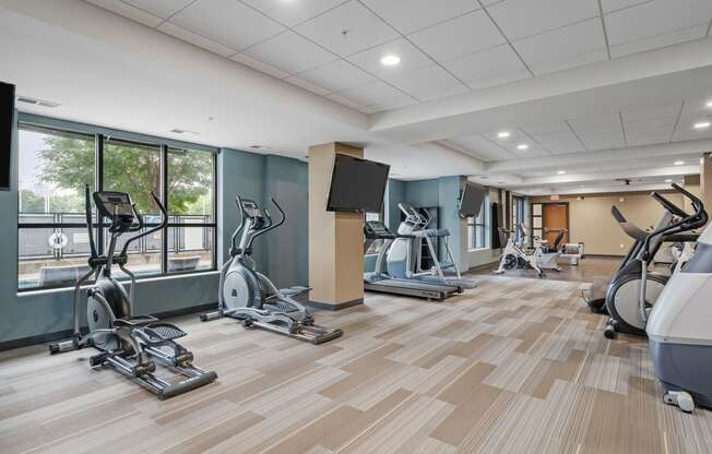 the gym with treadmills and weights at the preserve at greatstone