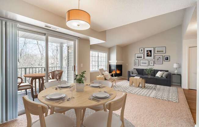 A dining room with a table set for six with a view of the backyard.