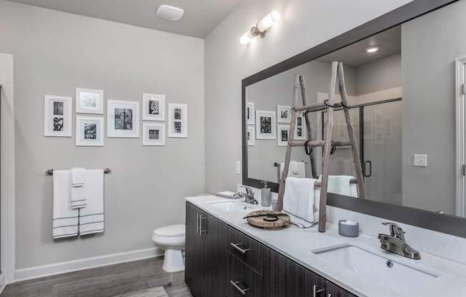 Spacious bathrooms with quartz countertops