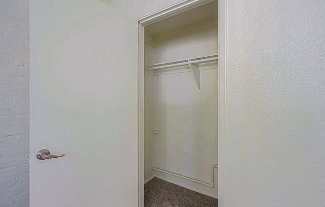 a walk in closet in a 555 waverly unit