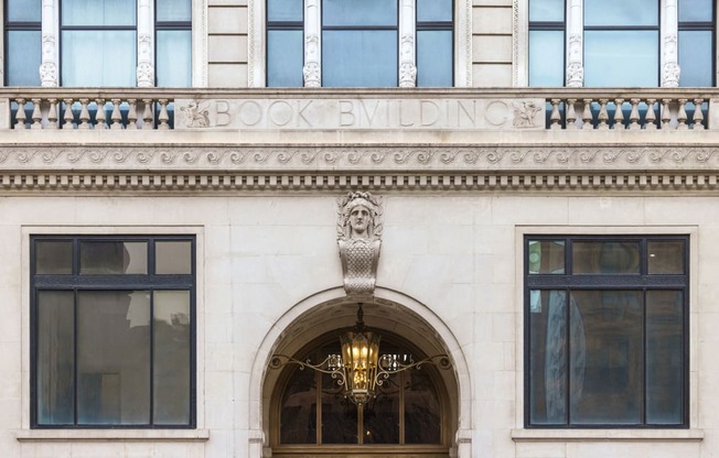 Washington Boulevard entrance showing the facade with a chandelier and the word book building at Book Tower, Michigan, 48226