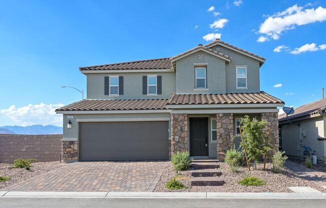 Mountains Edge!! Gated!!  4 bedrooms!! Primary Bedroom and bath down Stairs!! 2 Primary bedrooms!! Built 2021!!