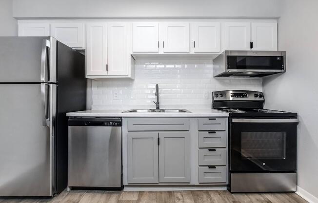 a kitchen with a stove top oven sitting inside of a refrigerator