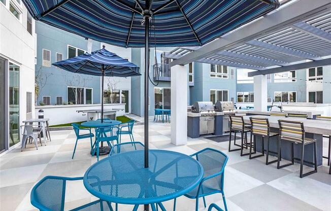 Rooftop patio with tables and chairs and umbrellas