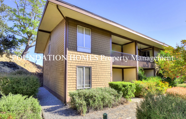 Bright & Tranquil End Unit!  A/C! Parking! Community Pool! FOUNDATION