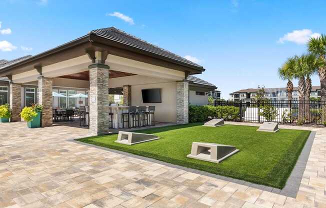 A house with a patio and a fence.