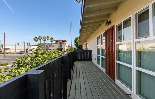 a balcony or terrace with a wooden deck