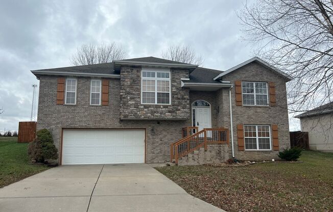 4 Bedroom Nixa Home with a fenced in backyard