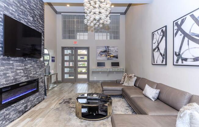 a living room filled with furniture and a fireplace