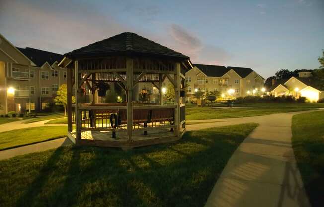 picture of gazebo in grass at dusk