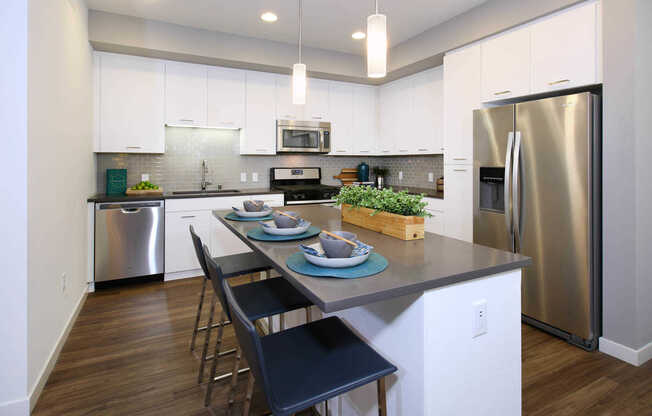 Kitchen with Stainless Steel Appliances and Quartz Counters