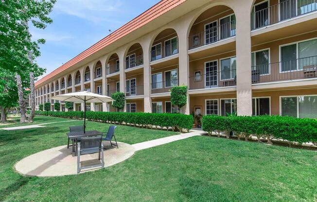 a large lawn in front of a building