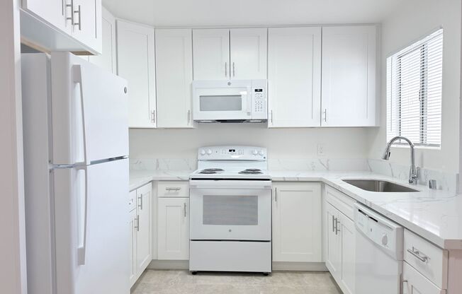 Uptown Villas | Spacious Apartments with parking in Grant Hill!